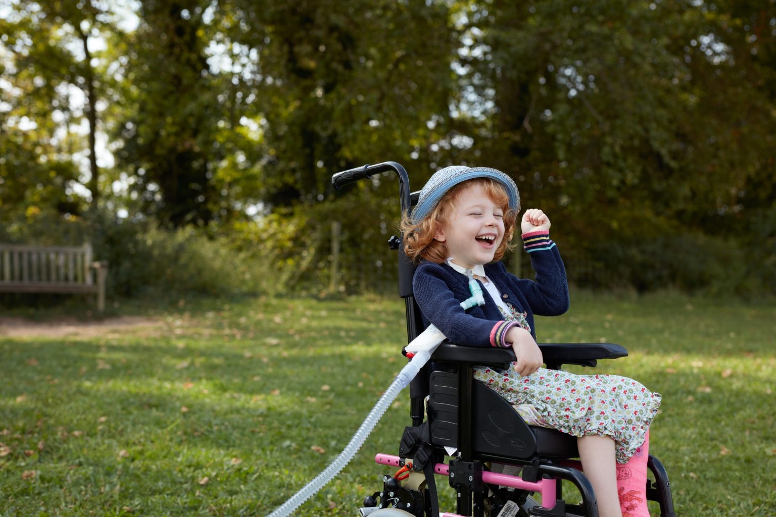 Girl smiling in wheelchair  