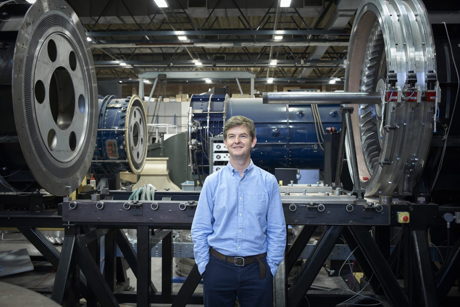 Professor Rob Miller standing in front of engine 