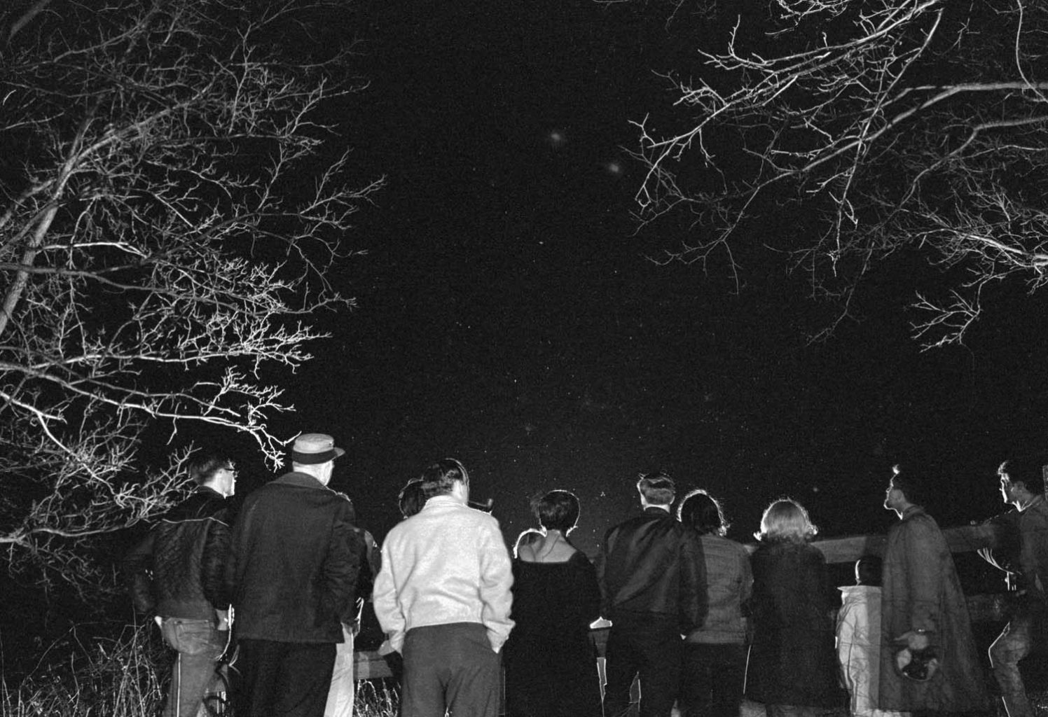 People Watching Night Sky For UFOs